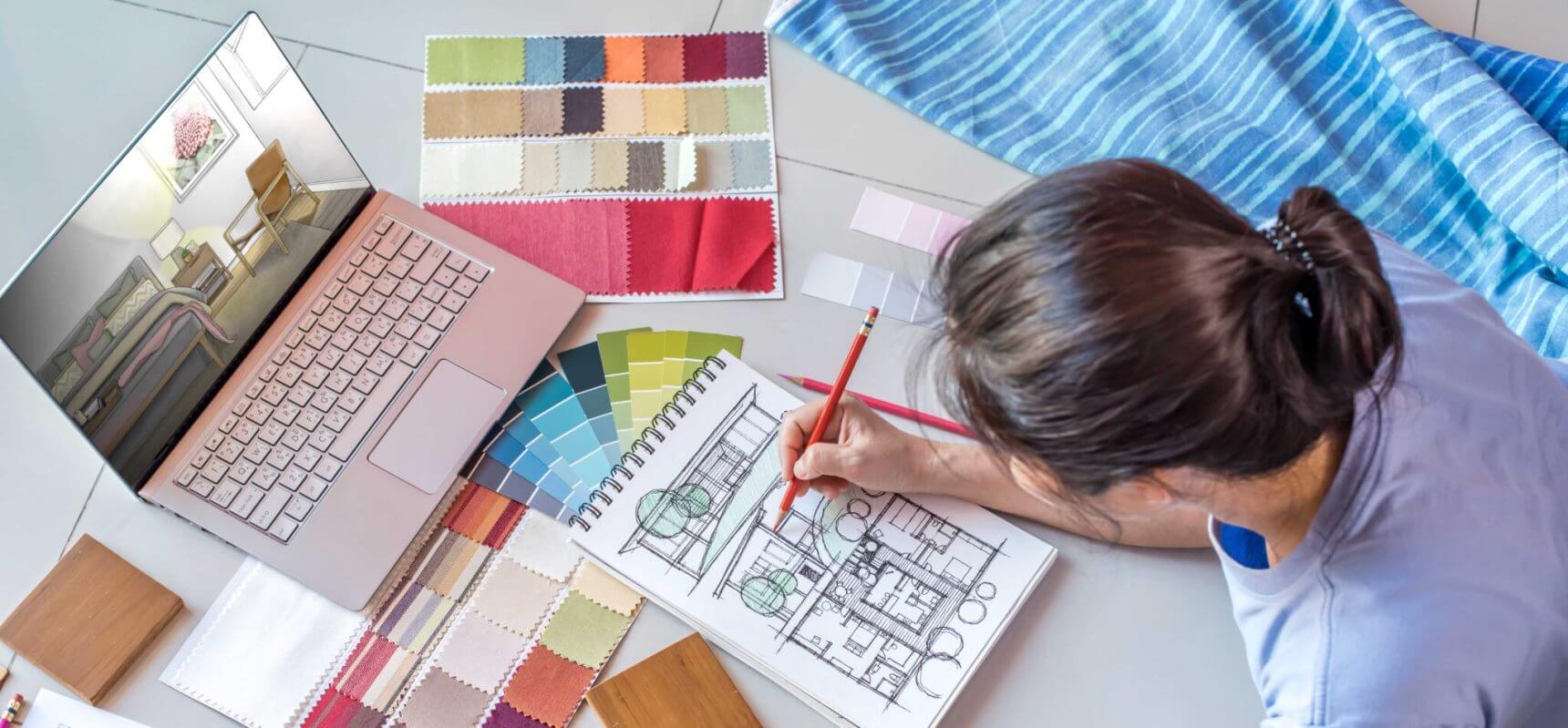 Interior designer working on the project using color swatches and materials samples