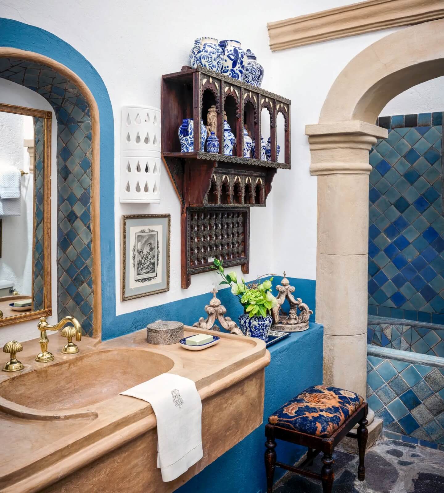 Bathroom with blue tiles as accent pieces