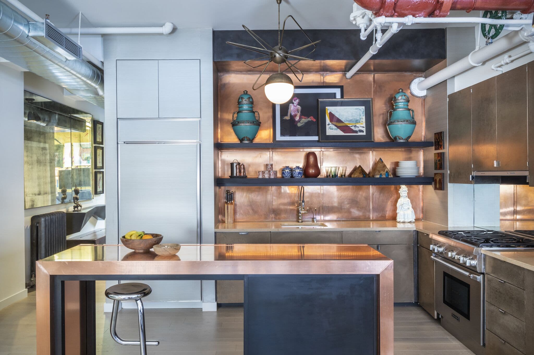 Kitchen with industrial design and artistic elements