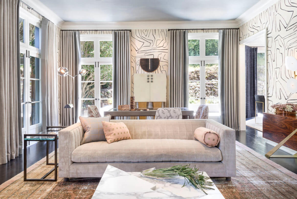 Spacious living room with three pairs of glass doors