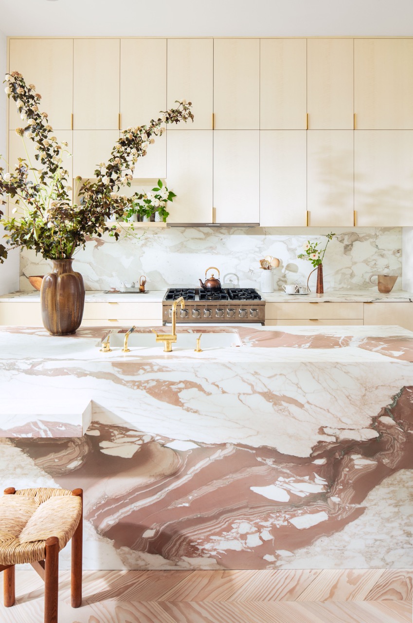 Bright kitchen with a marble kitchen island