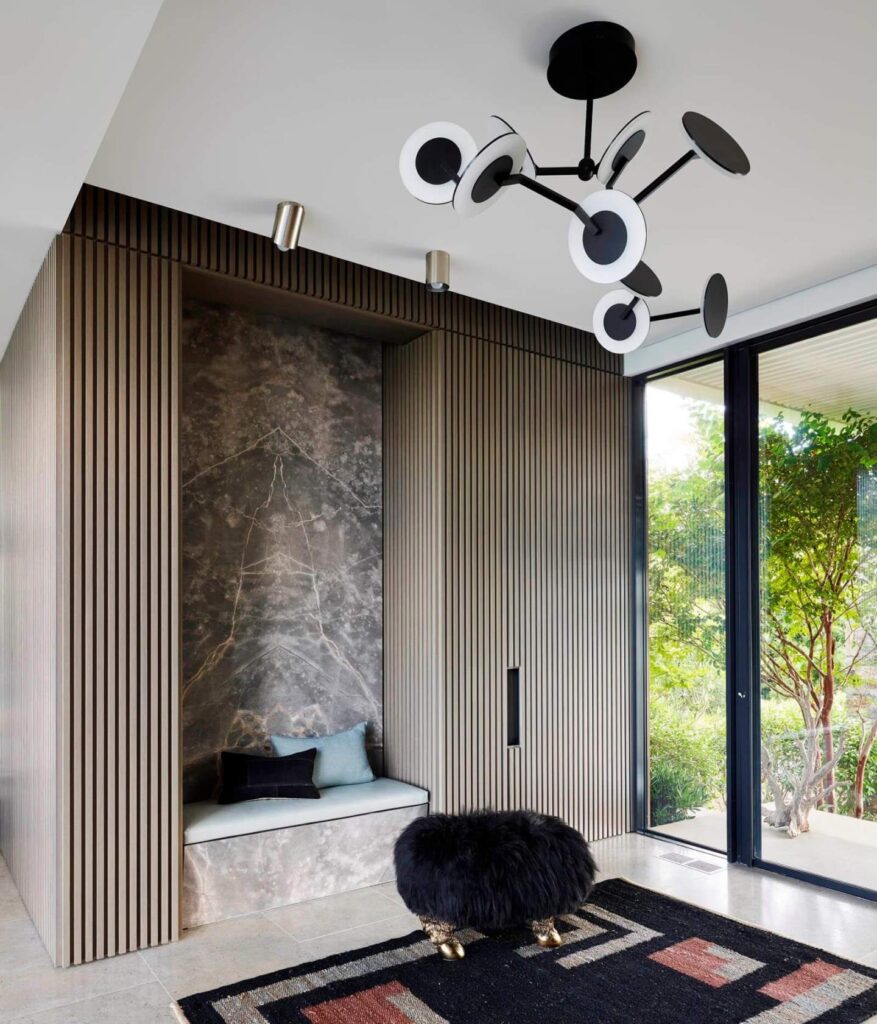 Modern hall with a wardrobe and a futuristic lamp