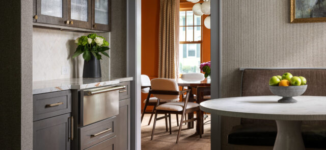 Kitchen with a view of the living room