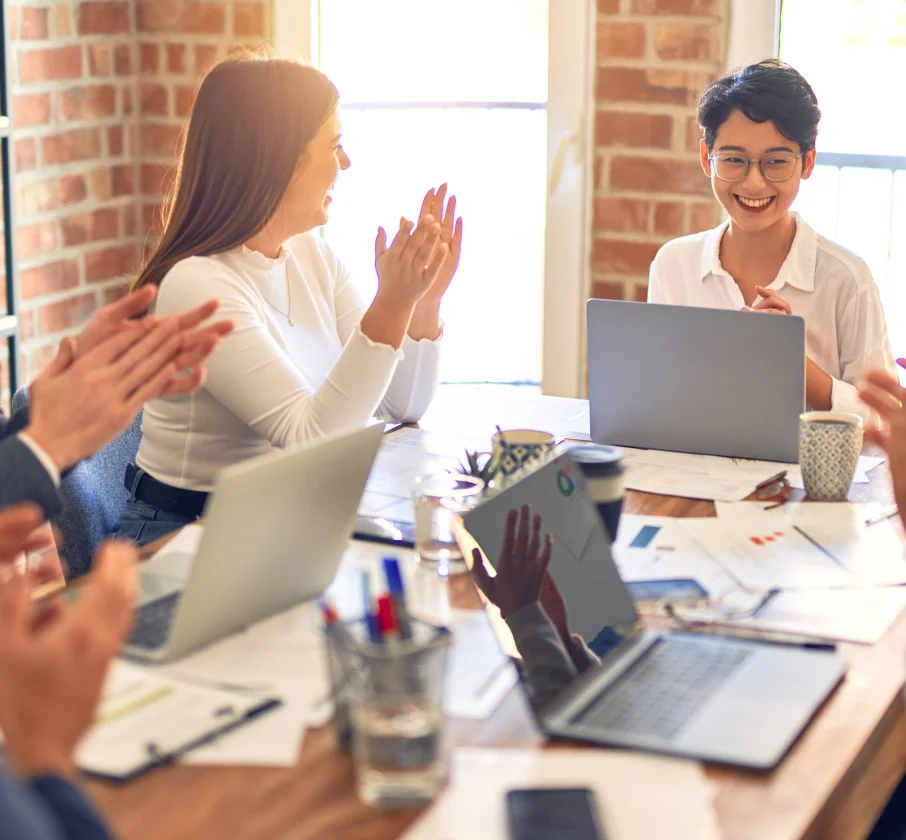 People applauding in the office room